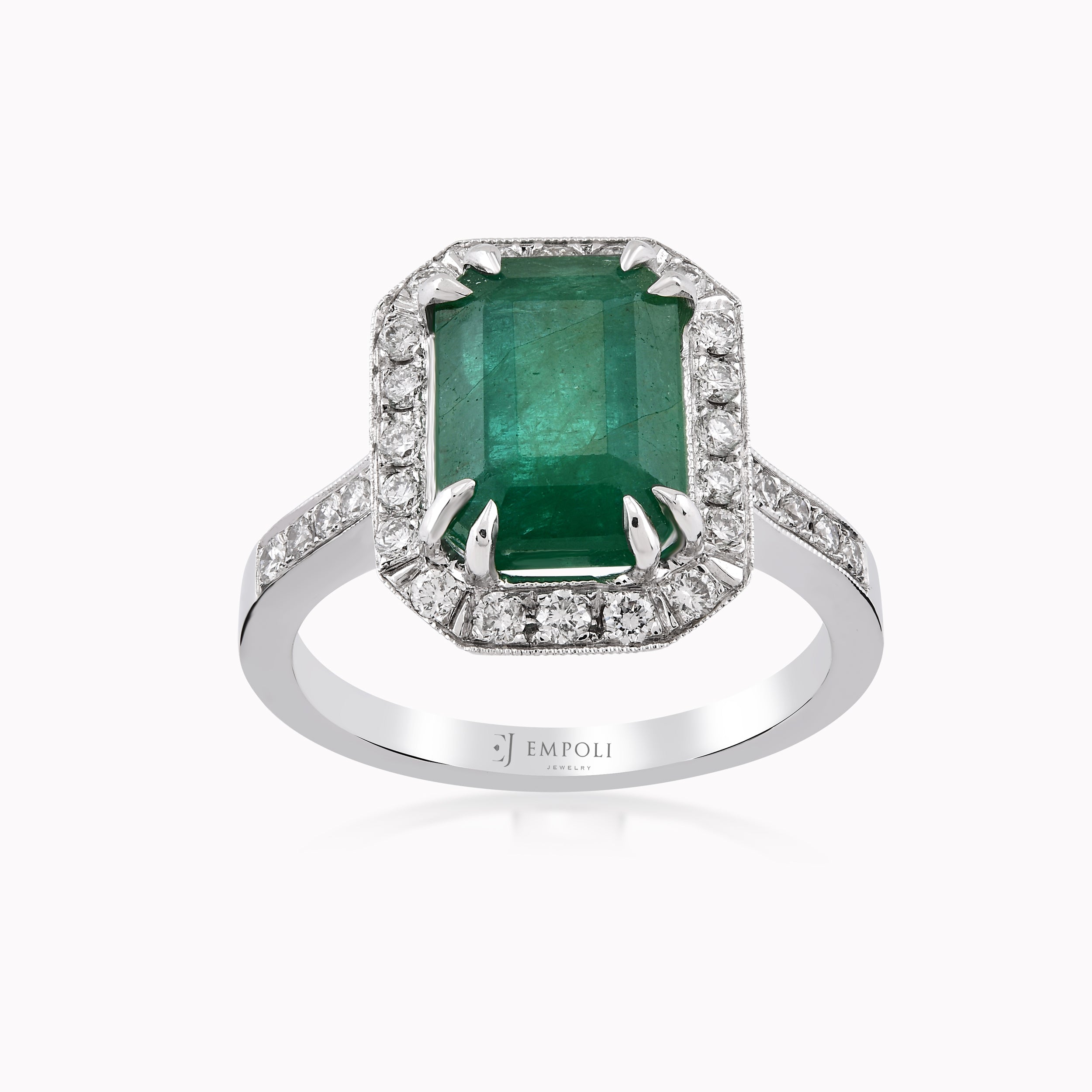 White Gold Ring 18K With Diamonds And Emerald 0.52ct
